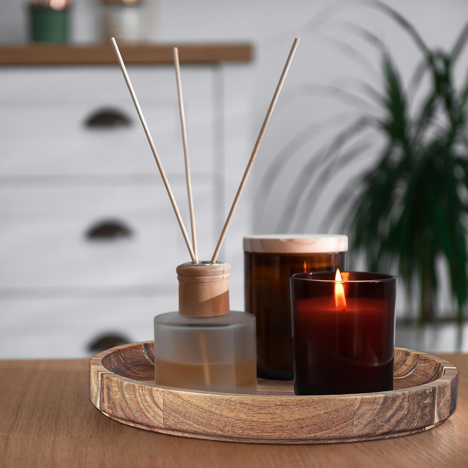 Natural wood platter used as candle holder plate