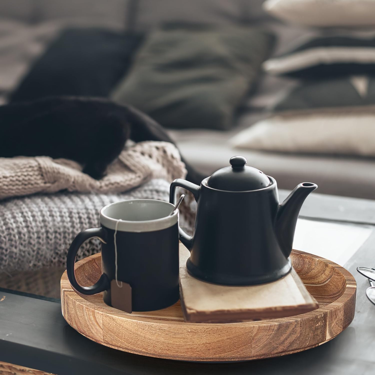Norevo round acacia tray on kitchen island table
