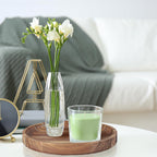 Rustic wooden tray centerpiece with candles and décor